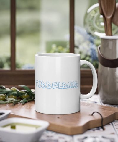 Kaffeetasse weiß mit norddeutschen Begriff "Tüddelband", 330ml Fassungsvermögen